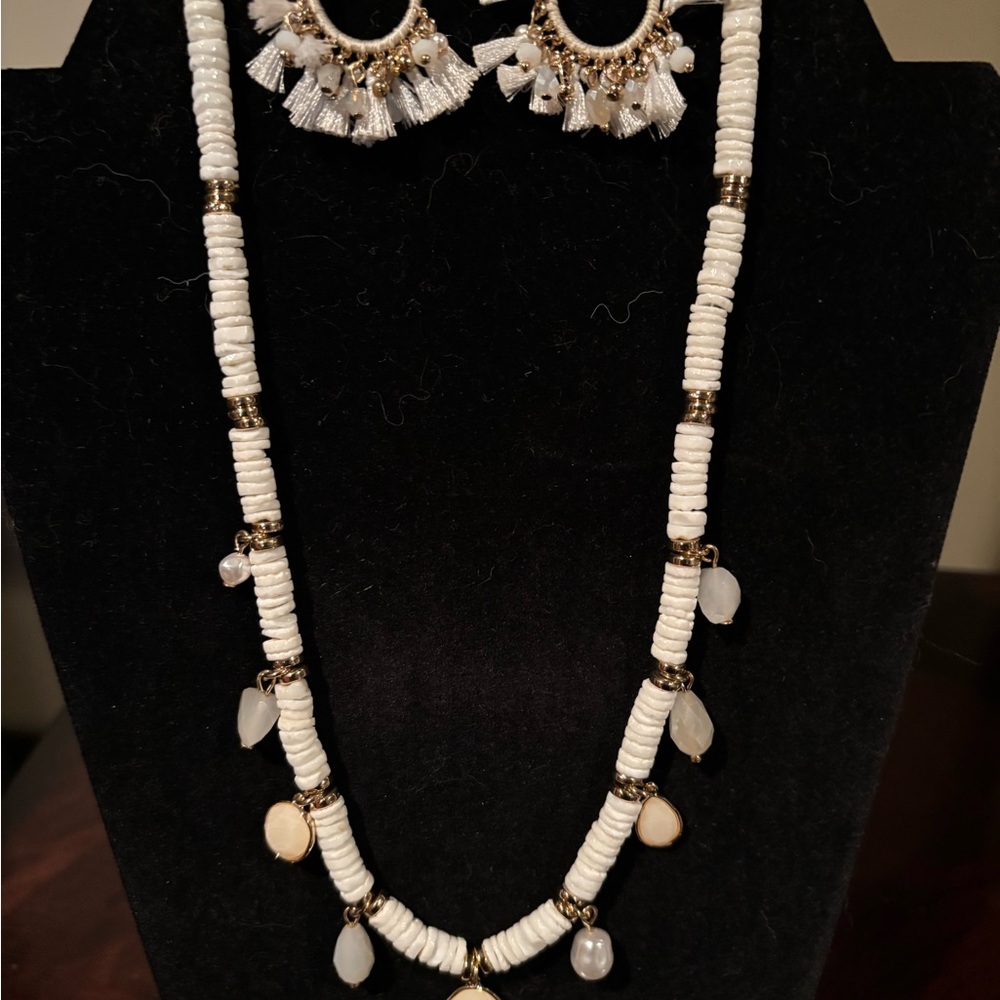 This is a beautiful White with GoldTone Necklace Earring Set New